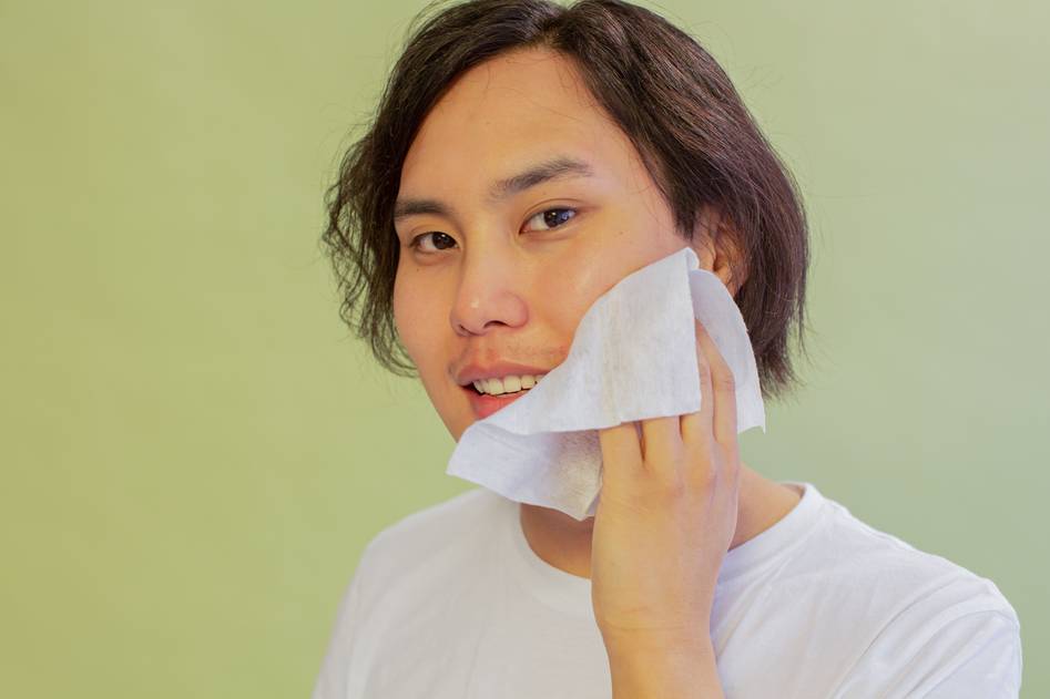 Close-up of rose-infused body wipes with delicate petals
