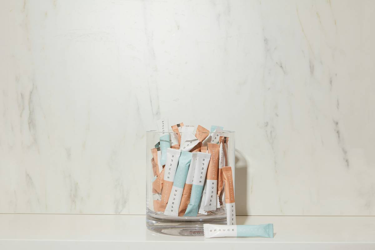 viracare adult body wet wipes in a travel pouch next to a gym bag